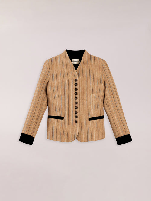 Chaqueta austriaca de mujer en lana beige con botones efecto carey y detalles de terciopelo negro